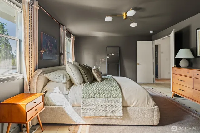 an aerial view of a residential houses with outdoor space and street view