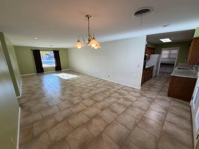 a view of a livingroom with a furniture