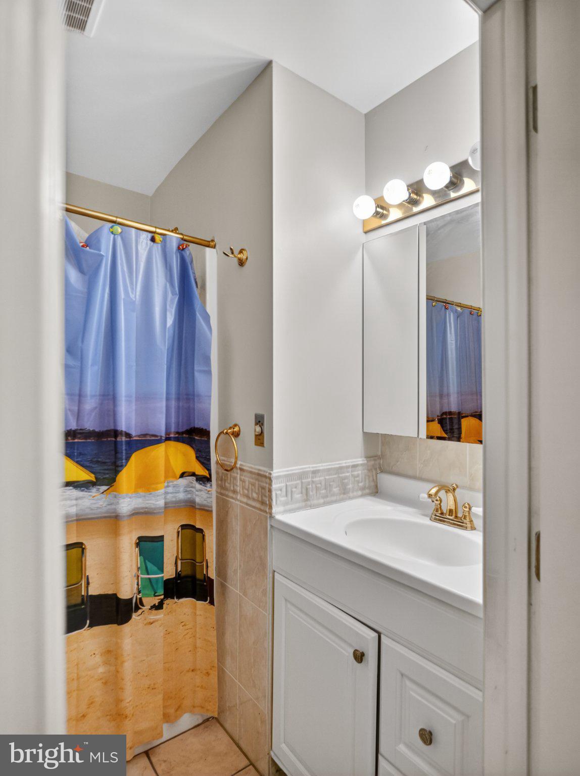 103 Channel Buoy Road Ocean City, MD 21842 - Photo 28 of 29 Coastal Charm in a Cozy Bath