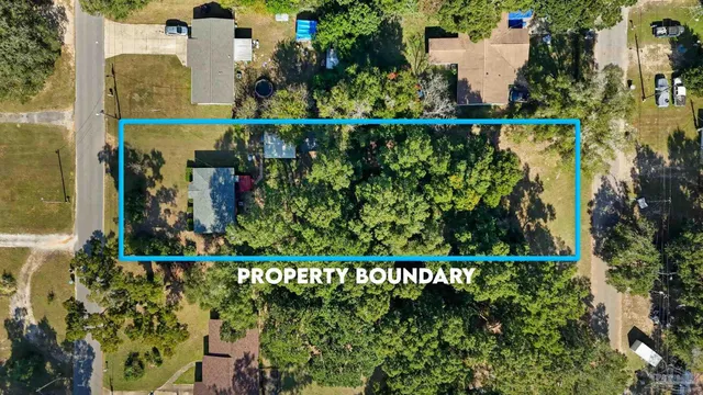 a sign that is on the side of the tree