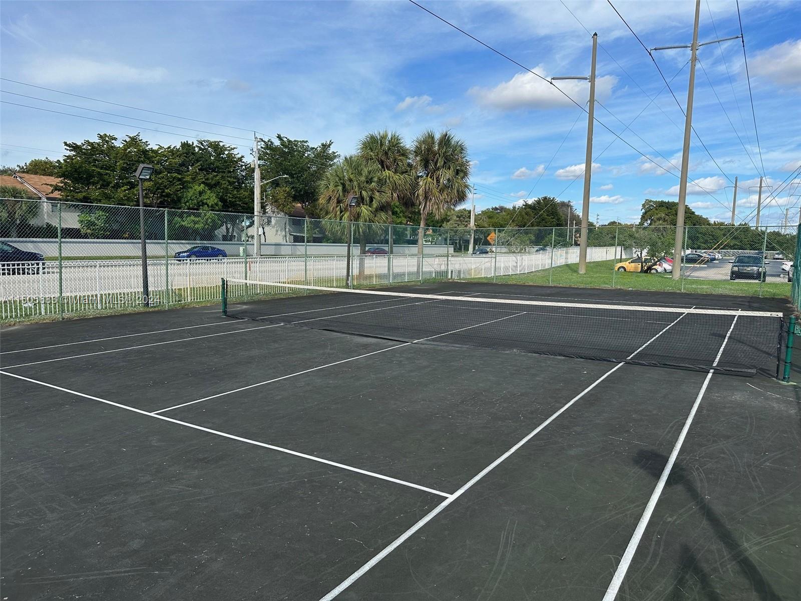 5686 Rock Island Road, Unit 134 Tamarac, FL 33319 - Photo 10 of 21 a view of a tennis court