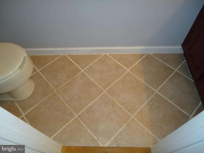 2141 Golf Course Drive Reston, VA 20191 - Photo 15 of 26 a bathroom with a bathtub