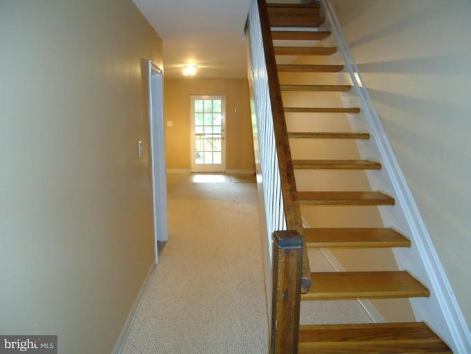 2141 Golf Course Drive Reston, VA 20191 - Photo 17 of 26 a view of entryway with wooden floor