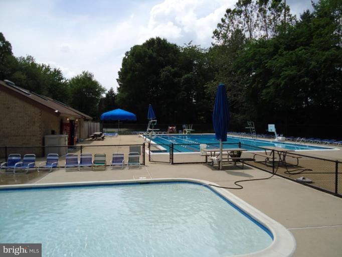 2141 Golf Course Drive Reston, VA 20191 - Photo 25 of 26 a view of a patio with swimming pool