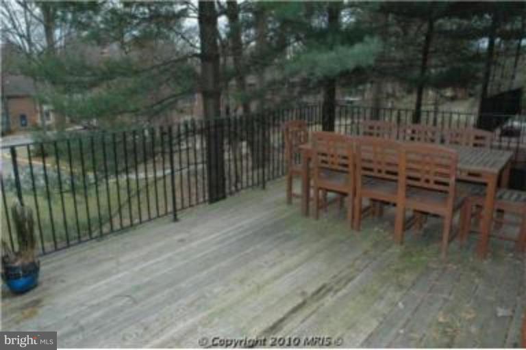 2141 Golf Course Drive Reston, VA 20191 - Photo 8 of 26 a view of a chairs and table in the patio