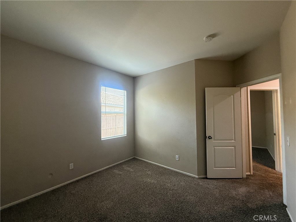 3518 Ranch Street Perris, CA 92571 - Photo 13 of 66 an empty room with windows
