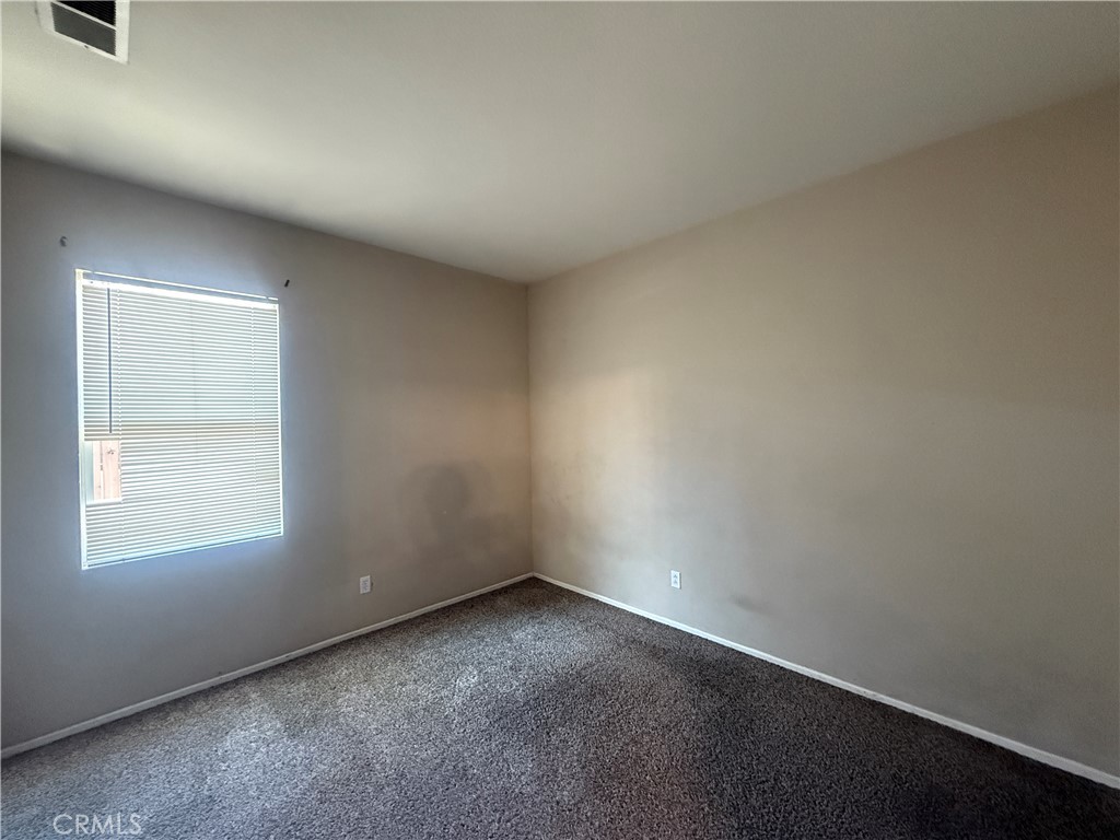 3518 Ranch Street Perris, CA 92571 - Photo 16 of 66 an empty room with a window
