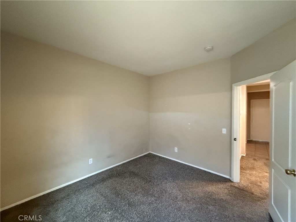 3518 Ranch Street Perris, CA 92571 - Photo 19 of 66 an empty room with a empty space and windows