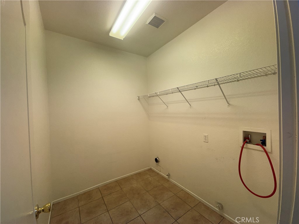 3518 Ranch Street Perris, CA 92571 - Photo 20 of 66 a bathroom with a sink and a shower