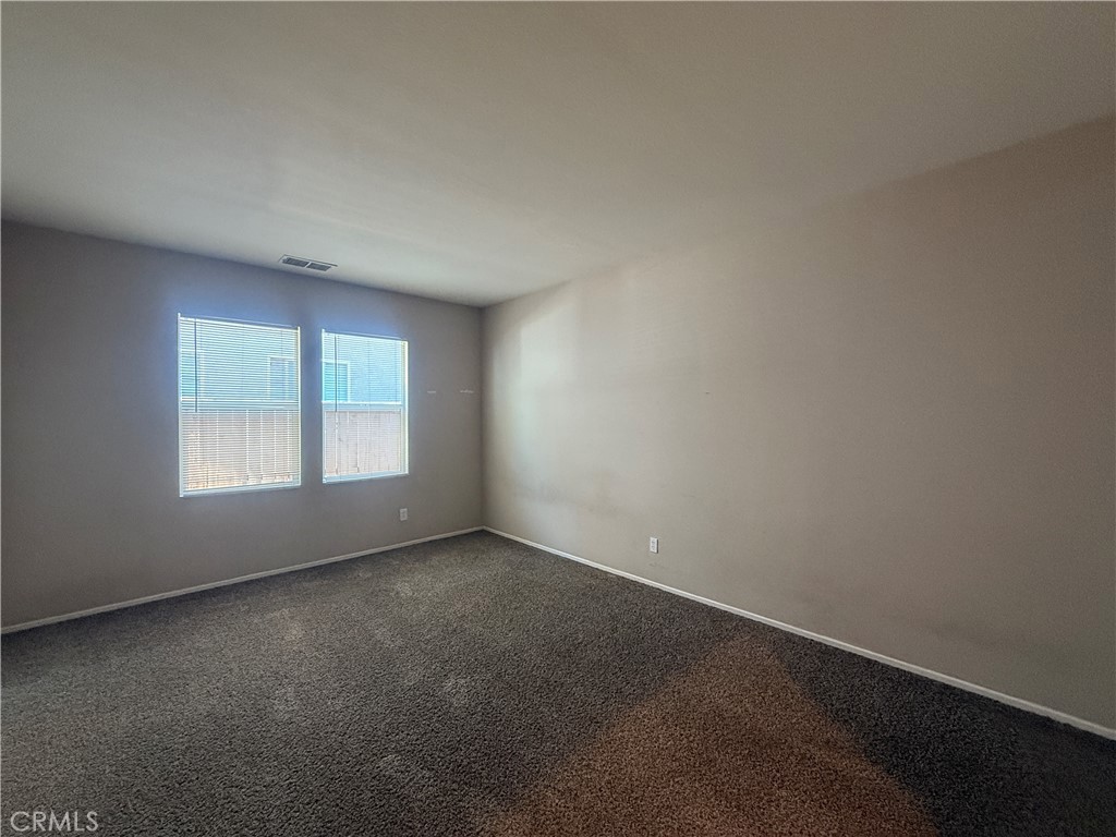 3518 Ranch Street Perris, CA 92571 - Photo 27 of 66 an empty room with a window