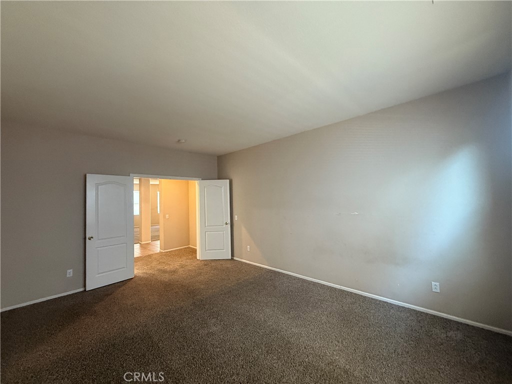 3518 Ranch Street Perris, CA 92571 - Photo 29 of 66 an empty room with a window