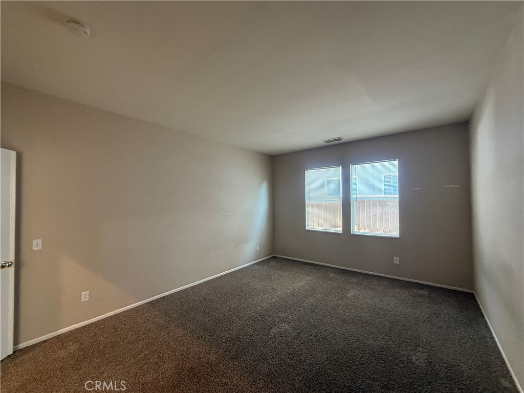 3518 Ranch Street Perris, CA 92571 - Photo 30 of 66 an empty room with a window