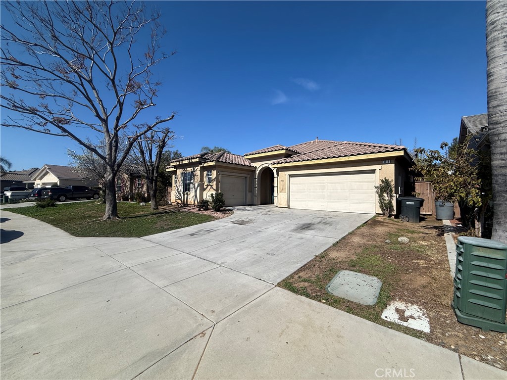 3518 Ranch Street Perris, CA 92571 - Photo 3 of 66 a view of a house with a yard