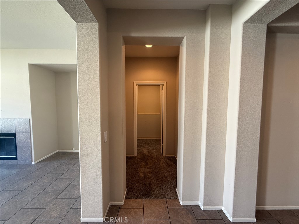 3518 Ranch Street Perris, CA 92571 - Photo 31 of 66 a view of a bathroom from a corridor