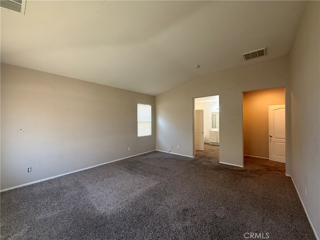 3518 Ranch Street Perris, CA 92571 - Photo 33 of 66 an empty room with windows