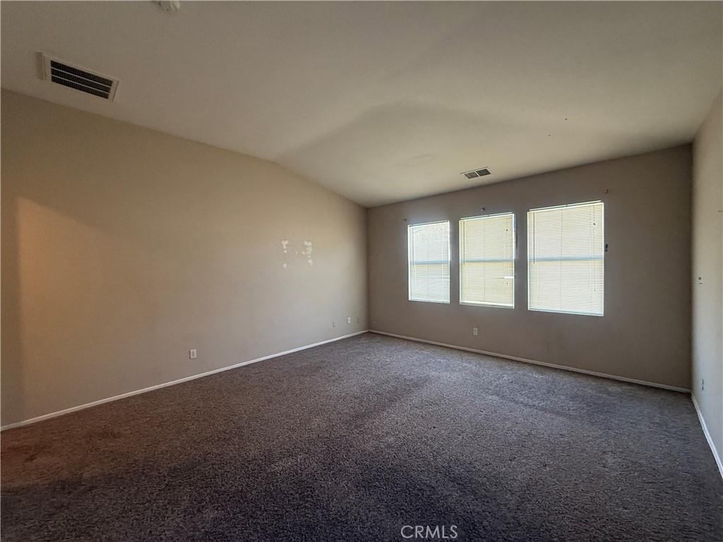 3518 Ranch Street Perris, CA 92571 - Photo 35 of 66 an empty room with a empty space and windows
