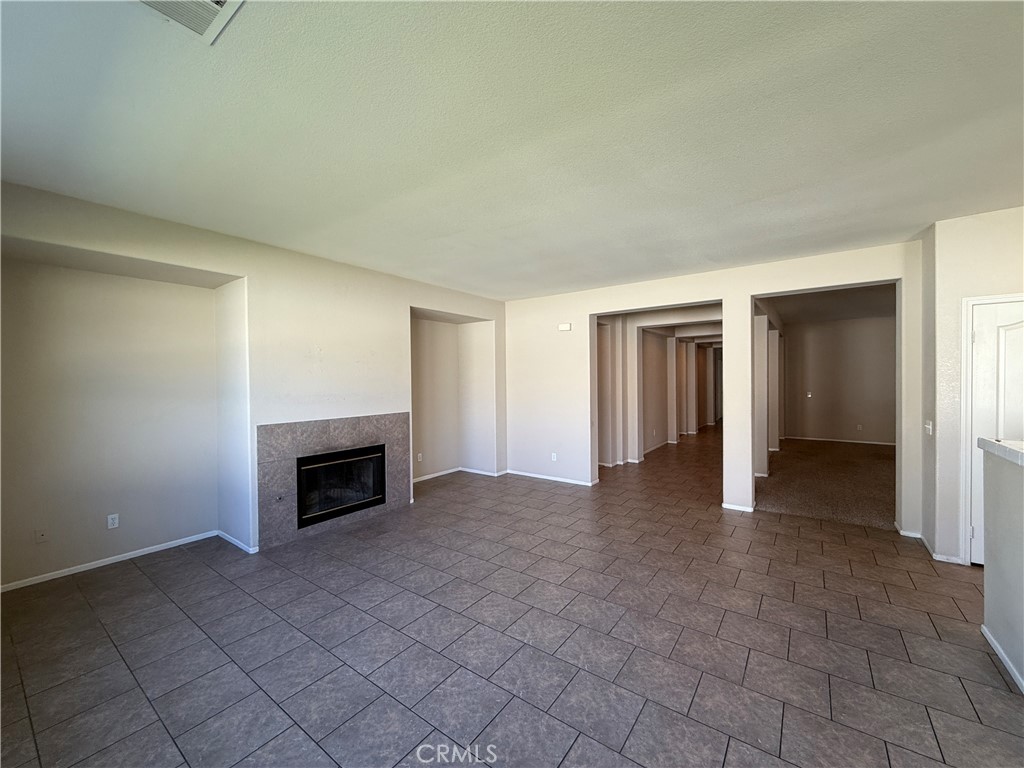 3518 Ranch Street Perris, CA 92571 - Photo 42 of 66 an empty room with fireplace