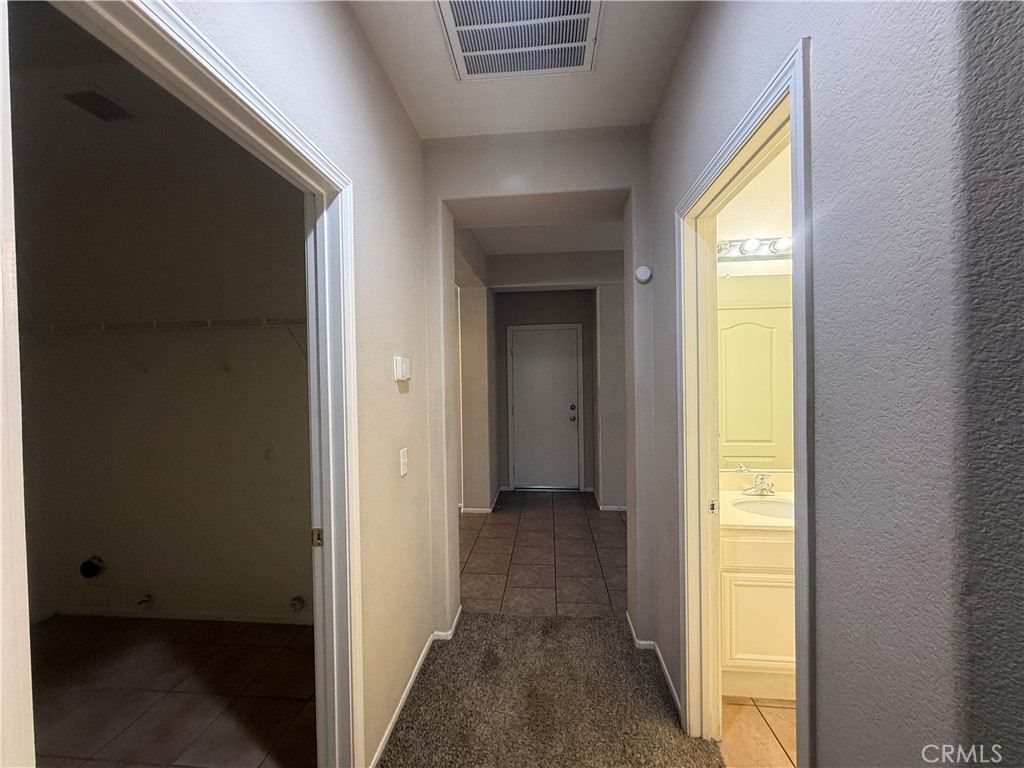 3518 Ranch Street Perris, CA 92571 - Photo 8 of 66 a view of hallway with wooden floor