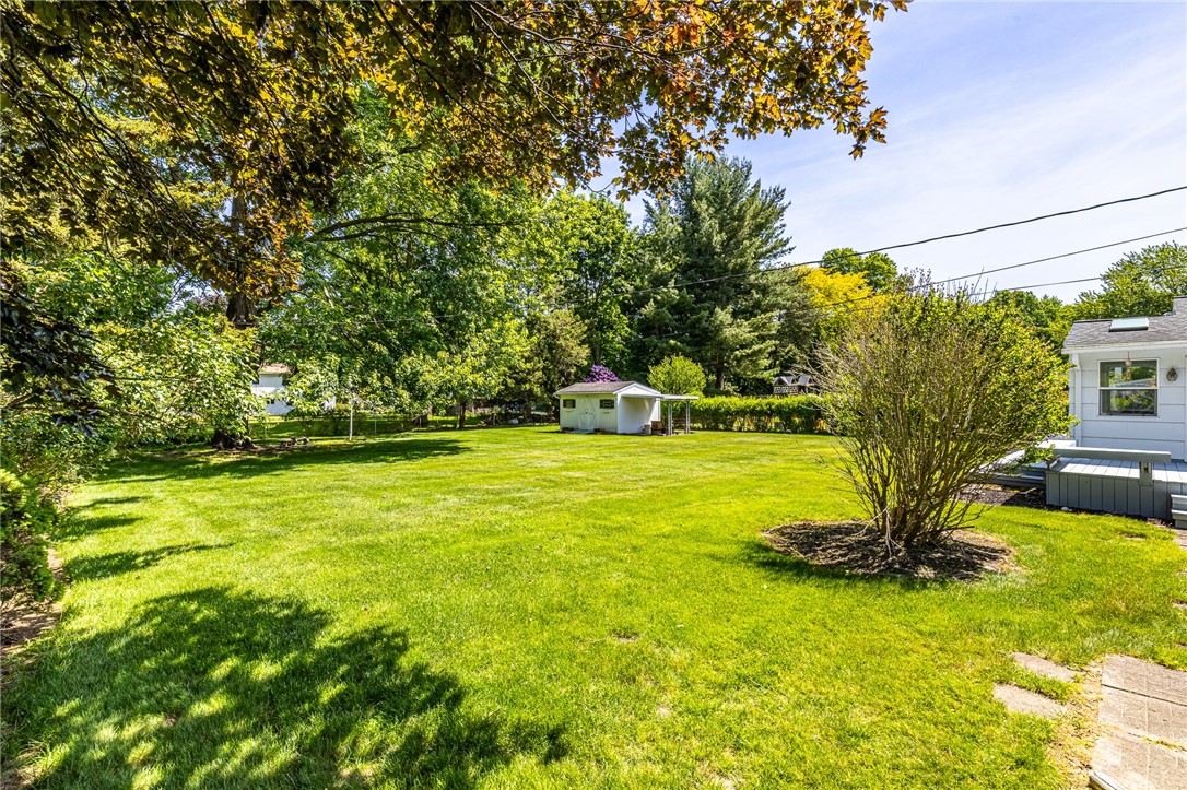 274 Parkview Drive Rochester, NY 14625 - Photo 38 of 41 Beautiful parklike yard with large shed.
