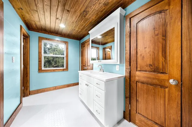 a view of a hallway with washer and dryer