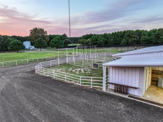 a view of a wooden fence