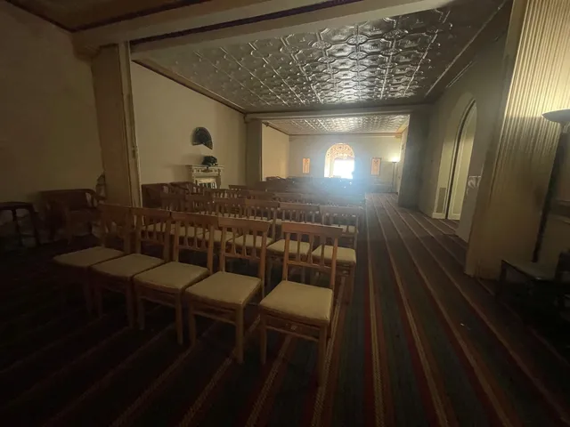 a view of room with wooden floor and chair