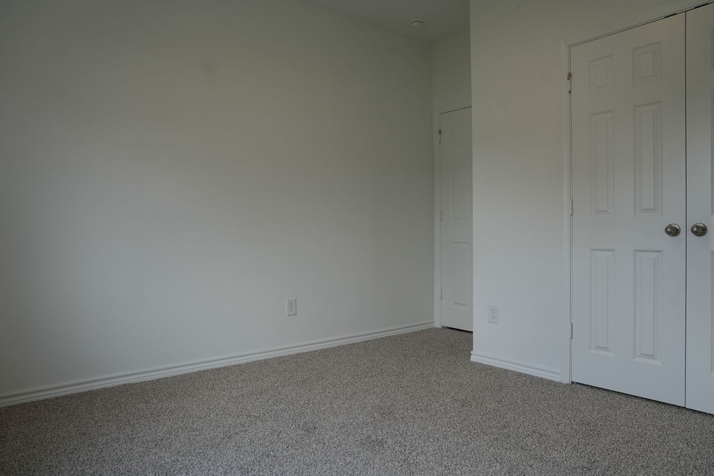 807 Stoney Point Lane Dayton, TX 77535 - Photo 16 of 19 a view of an empty room