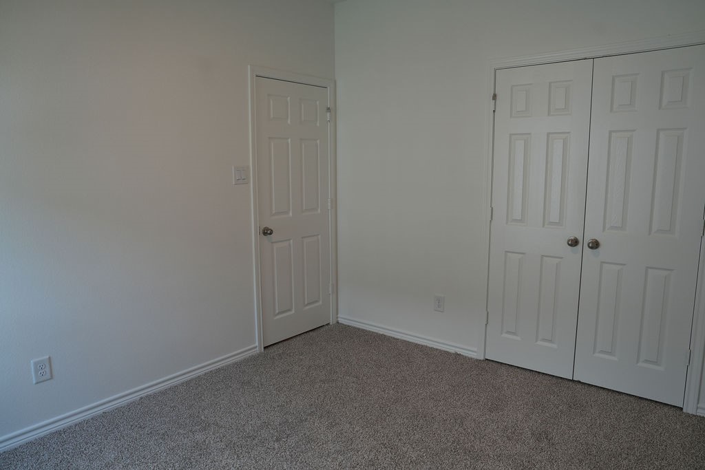 807 Stoney Point Lane Dayton, TX 77535 - Photo 19 of 19 a view of an empty room