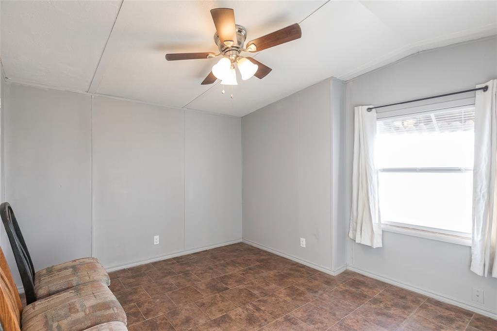 709 Gibson Street Tye, TX 79603 - Photo 9 of 26 a view of an empty room with a window