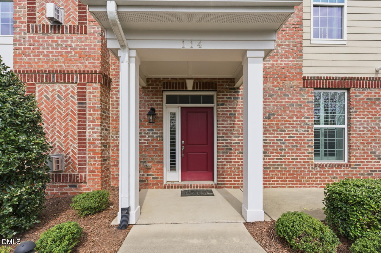 a front view of a house with a garage