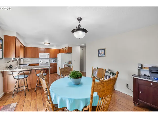 a workspace with furniture and a bookshelf