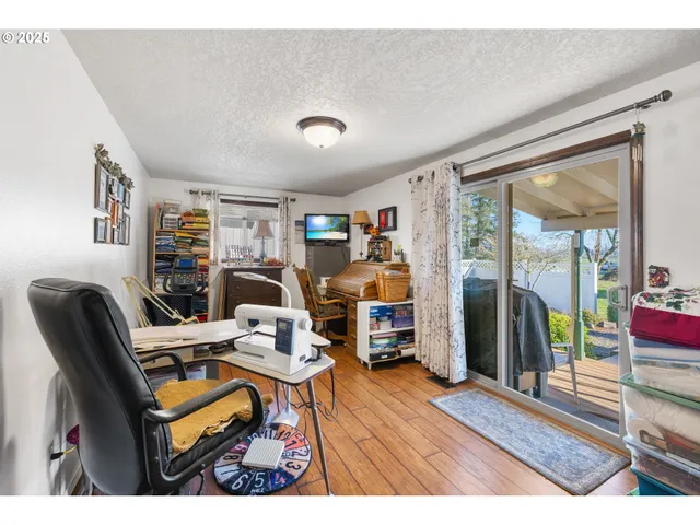 a view of swimming pool from a living room