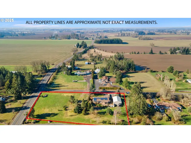 a view of multiple houses with a yard