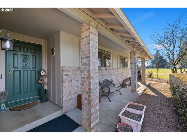 a view of a livingroom with furniture and cabinet