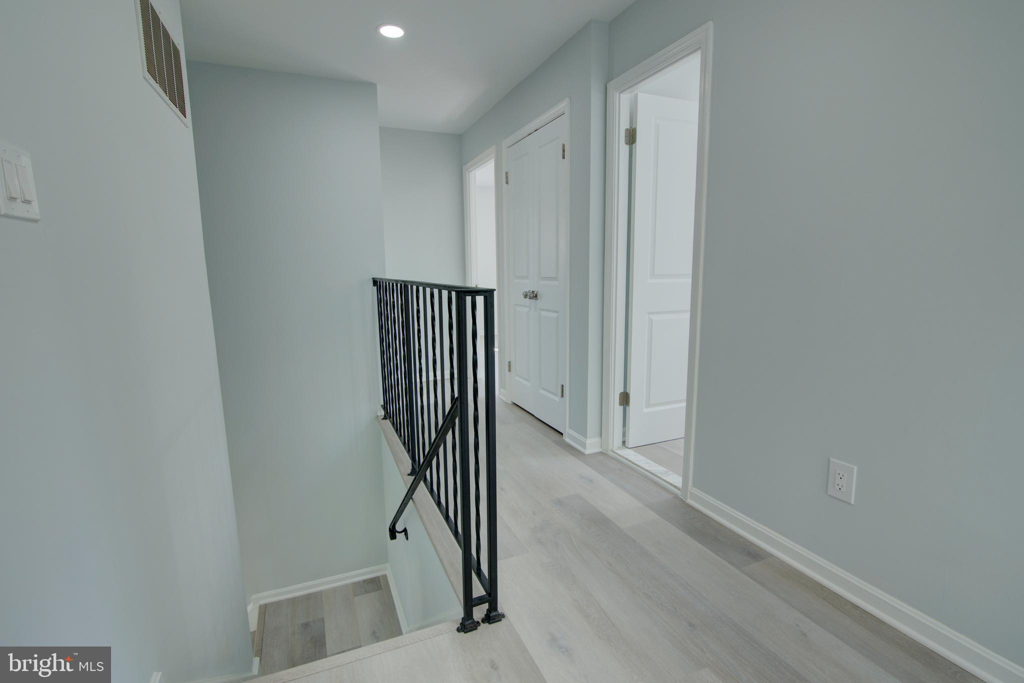 7411 Reservation Drive Springfield, VA 22153 - Photo 12 of 30 a view of entryway with wooden floor