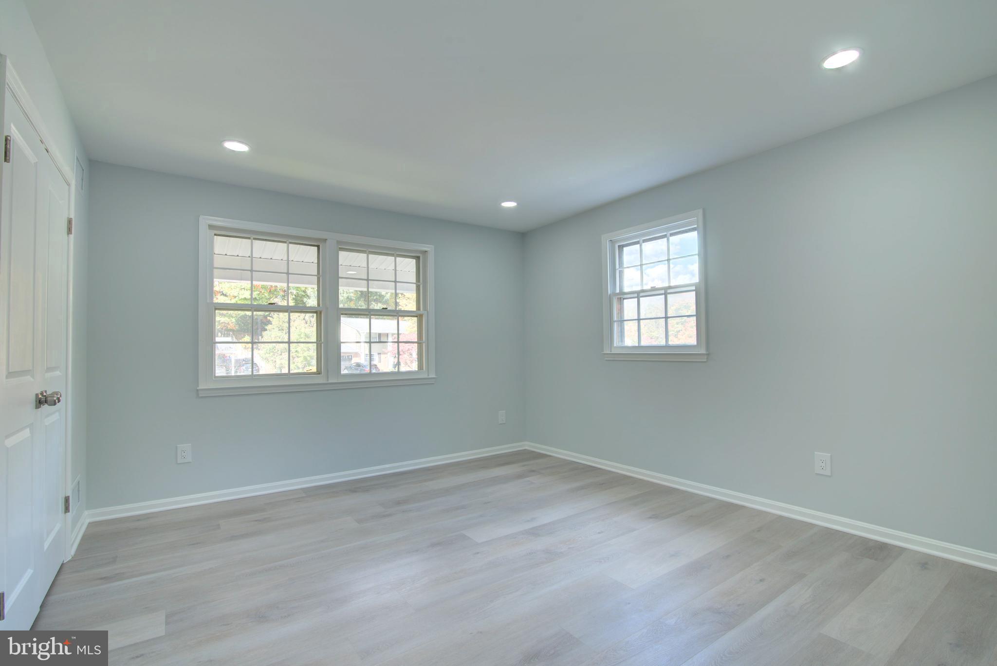 7411 Reservation Drive Springfield, VA 22153 - Photo 15 of 30 an empty room with windows