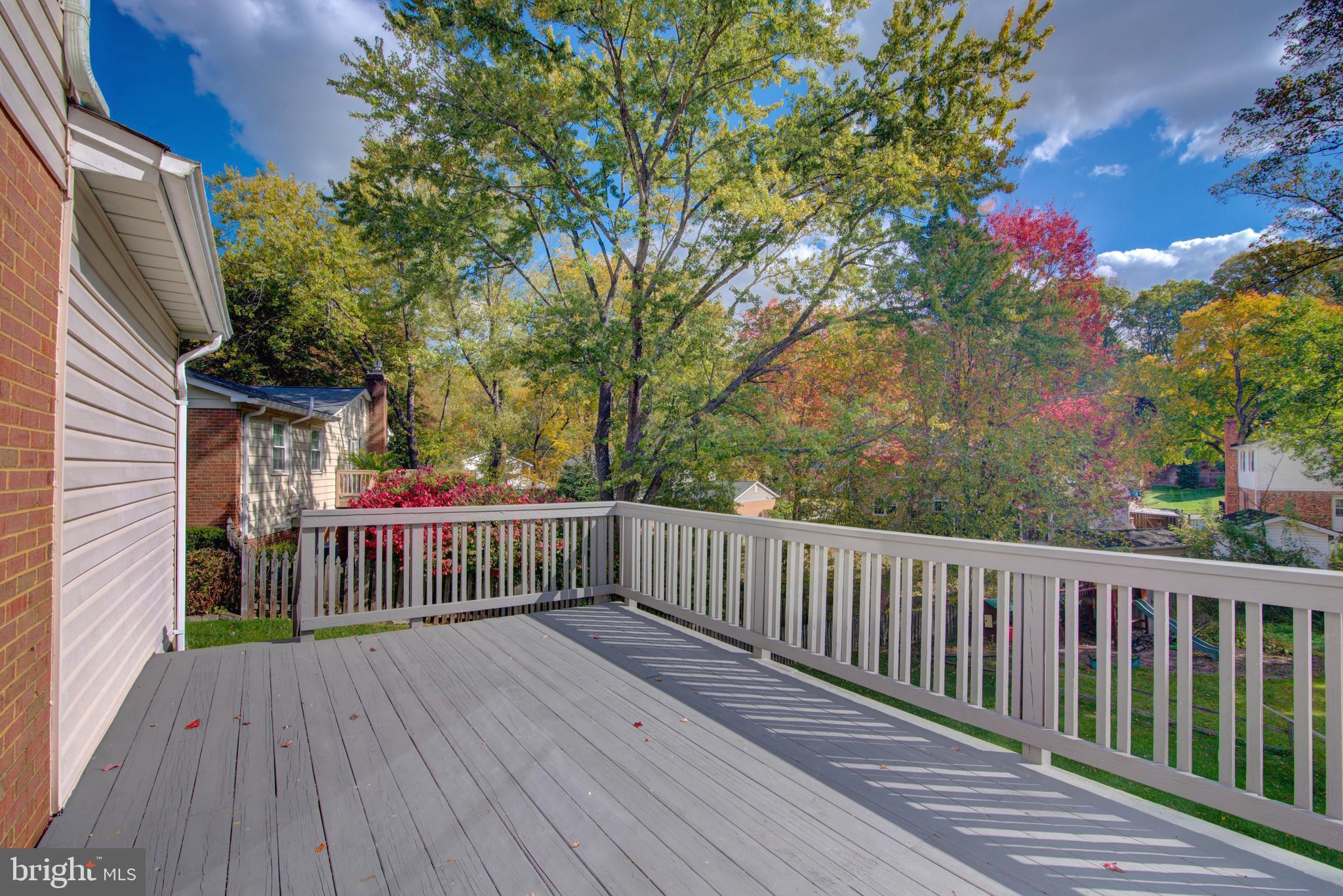 7411 Reservation Drive Springfield, VA 22153 - Photo 26 of 30 a view of deck with wooden floor and fence