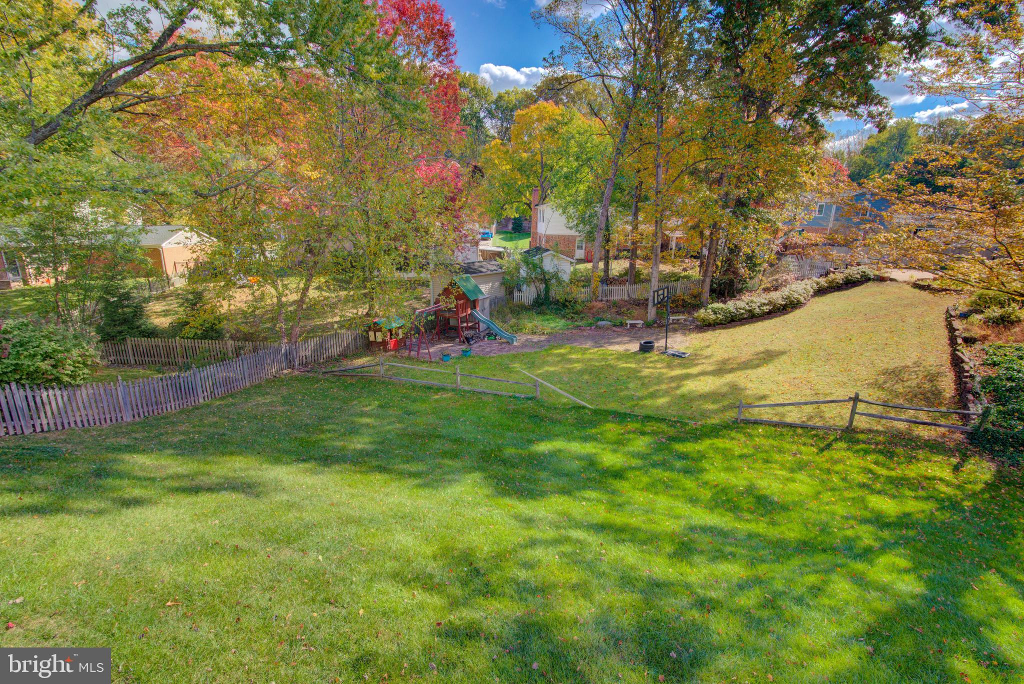 7411 Reservation Drive Springfield, VA 22153 - Photo 28 of 30 a view of yard with swimming pool and seating area