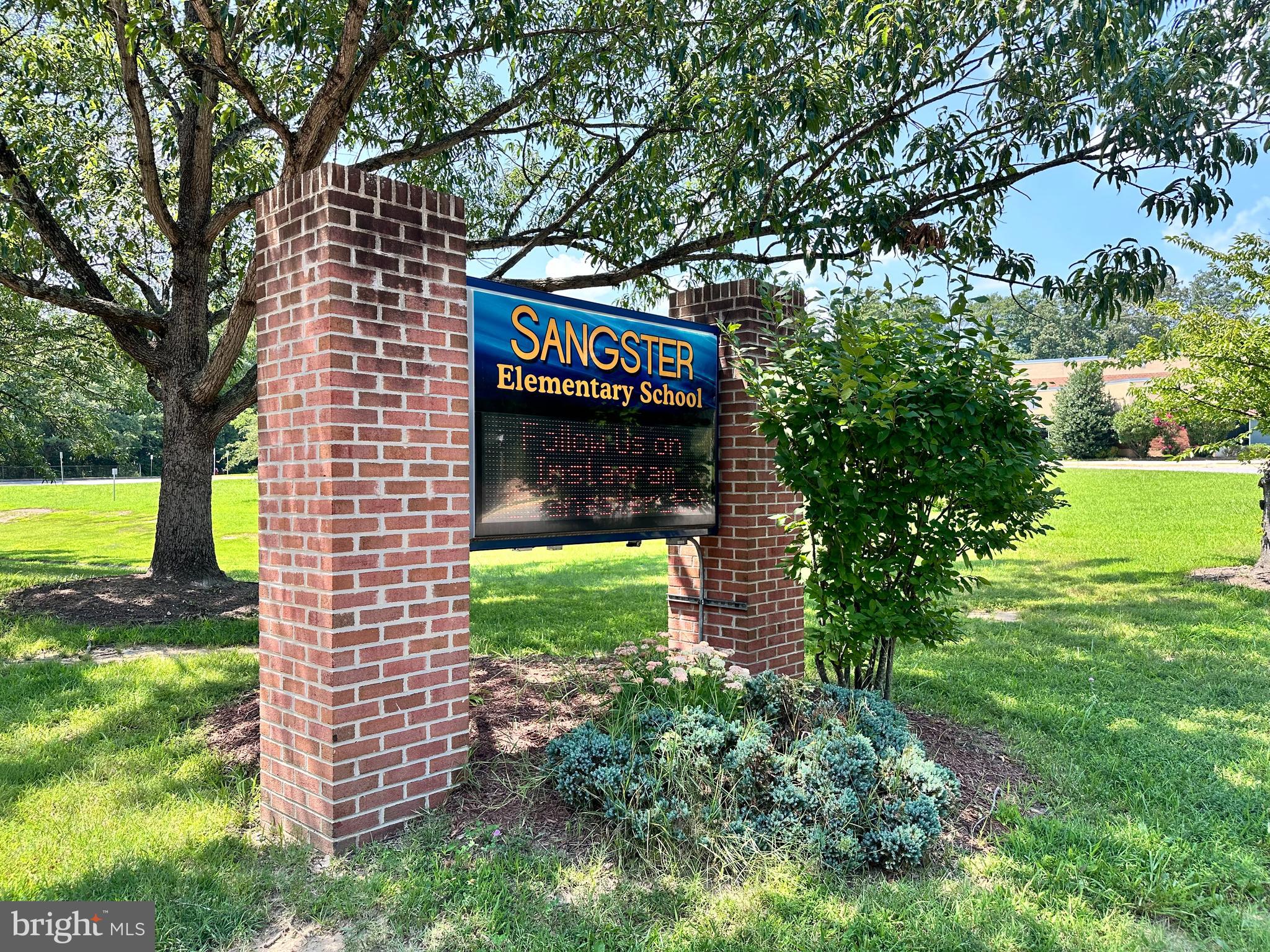 7411 Reservation Drive Springfield, VA 22153 - Photo 30 of 30 a sign that is sitting in the middle of a yard
