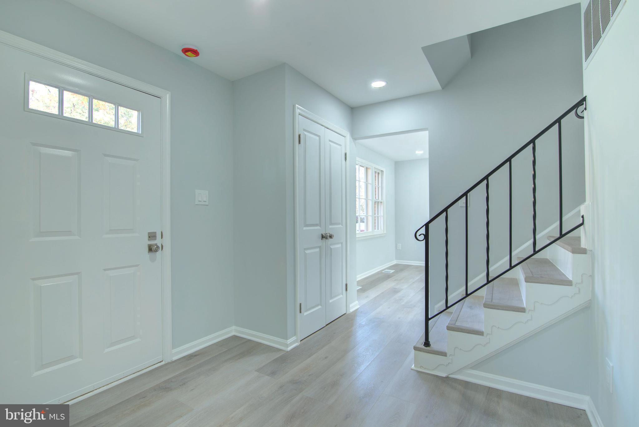 7411 Reservation Drive Springfield, VA 22153 - Photo 8 of 30 a view of entryway with wooden floor