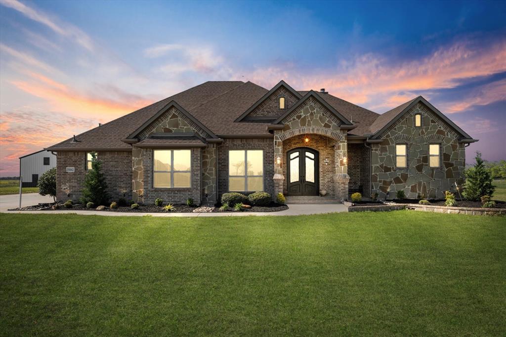 1842 Hunsucker Road Palmer, TX 75152 - Photo 1 of 1 View of front of home featuring a shingled roof, french doors, brick siding, and a lawn