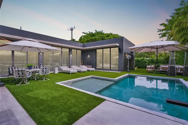 a view of a house with a swimming pool