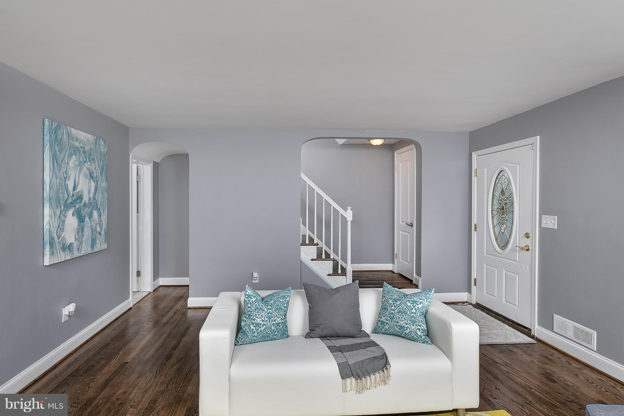 707 Stamford Road Baltimore, MD 21229 - Photo 12 of 30 a living room with furniture and painting on the wall