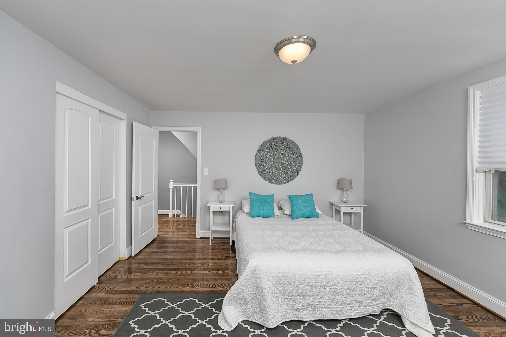 707 Stamford Road Baltimore, MD 21229 - Photo 16 of 30 a bedroom with a bed and window