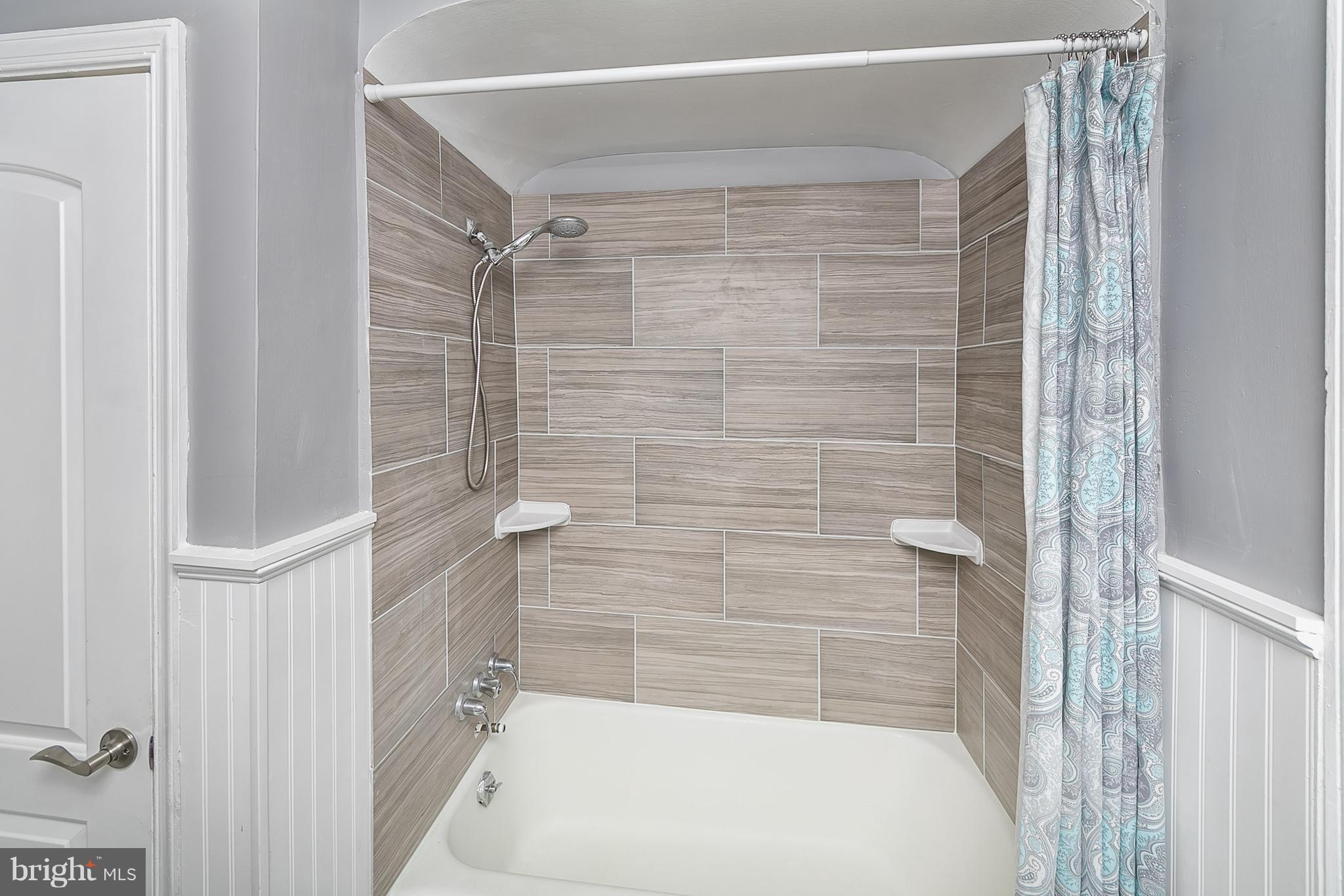 707 Stamford Road Baltimore, MD 21229 - Photo 23 of 30 a bathroom with a shower