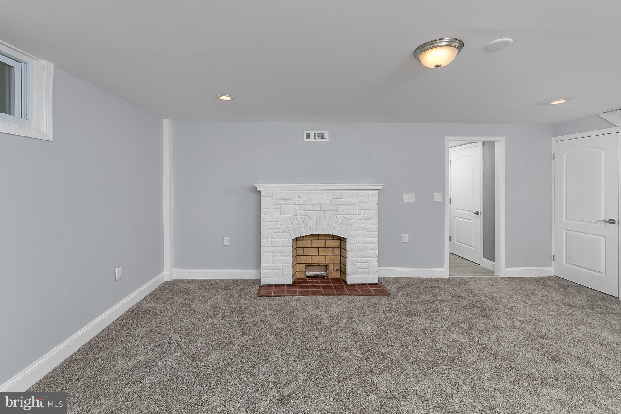707 Stamford Road Baltimore, MD 21229 - Photo 24 of 30 an empty room with garden and mirror