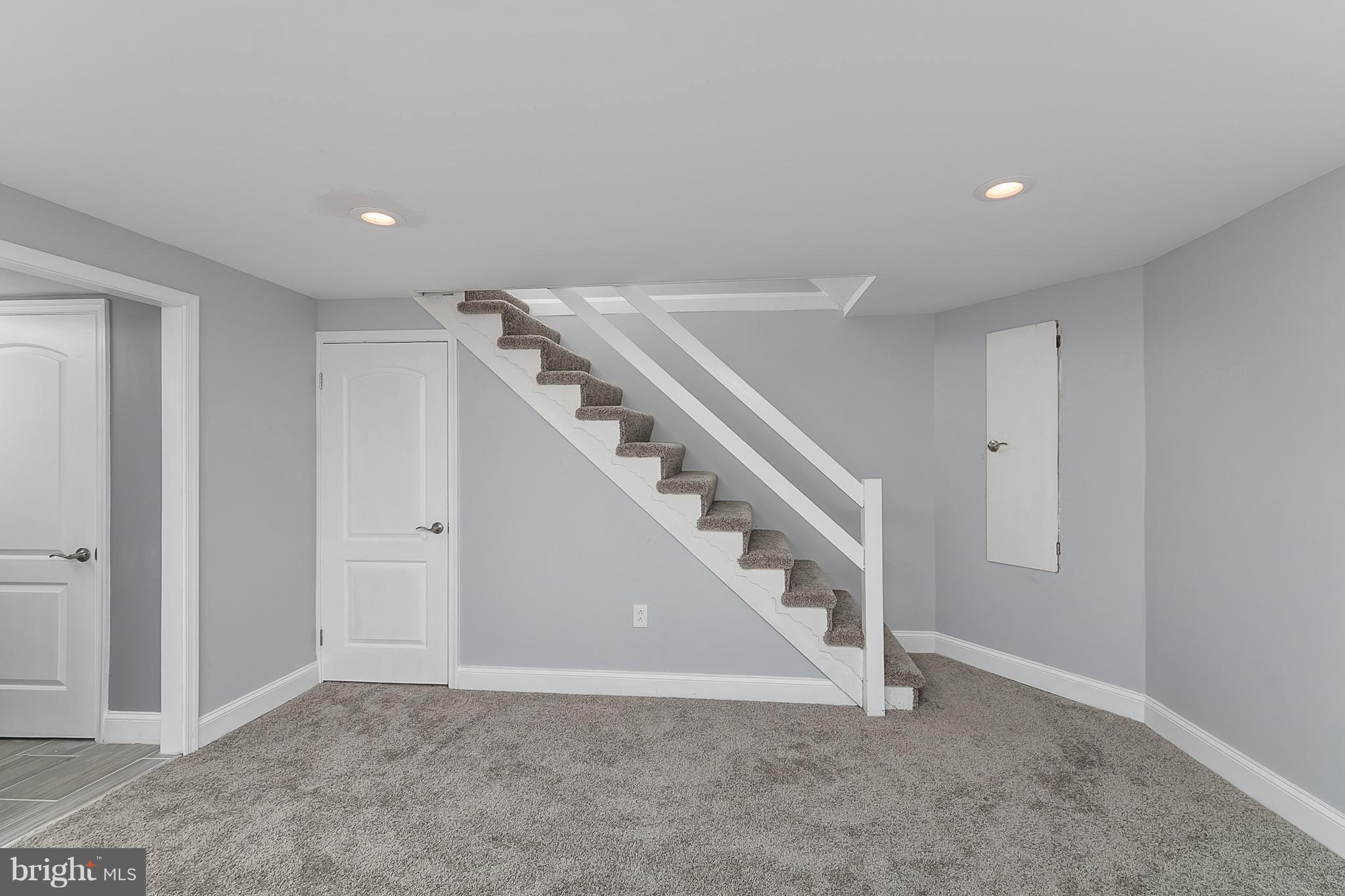 707 Stamford Road Baltimore, MD 21229 - Photo 25 of 30 a view of an empty room with stairs