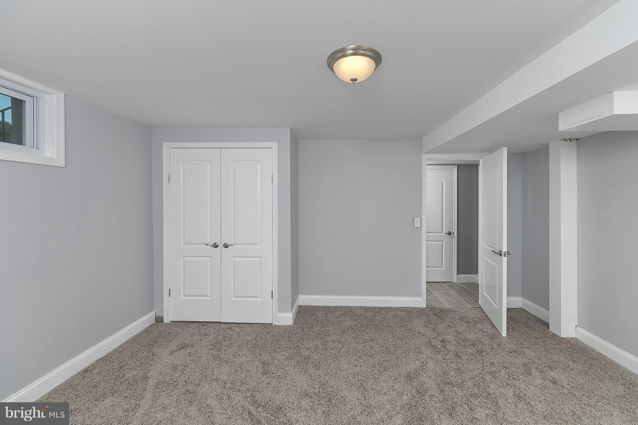 707 Stamford Road Baltimore, MD 21229 - Photo 28 of 30 a view of an empty room and window