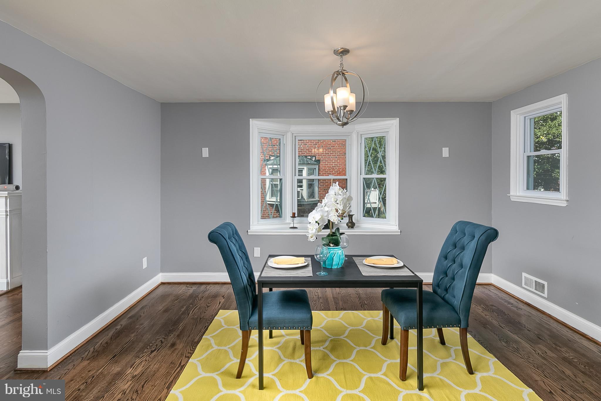707 Stamford Road Baltimore, MD 21229 - Photo 9 of 30 a view of a dining room with furniture