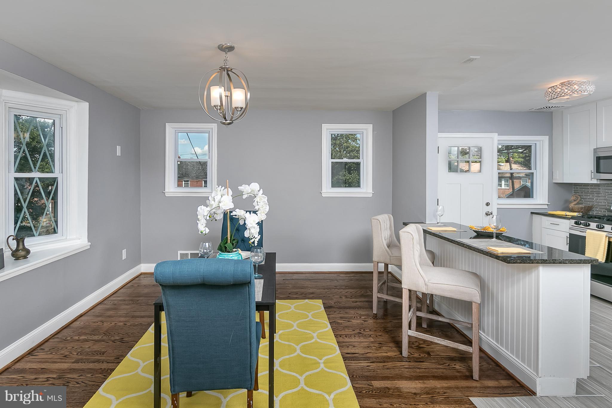 707 Stamford Road Baltimore, MD 21229 - Photo 10 of 30 a view of a dining room with furniture